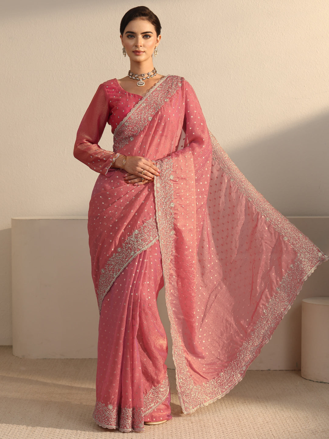  Libas Peach Woven Design Tissue Saree with Floral Border 