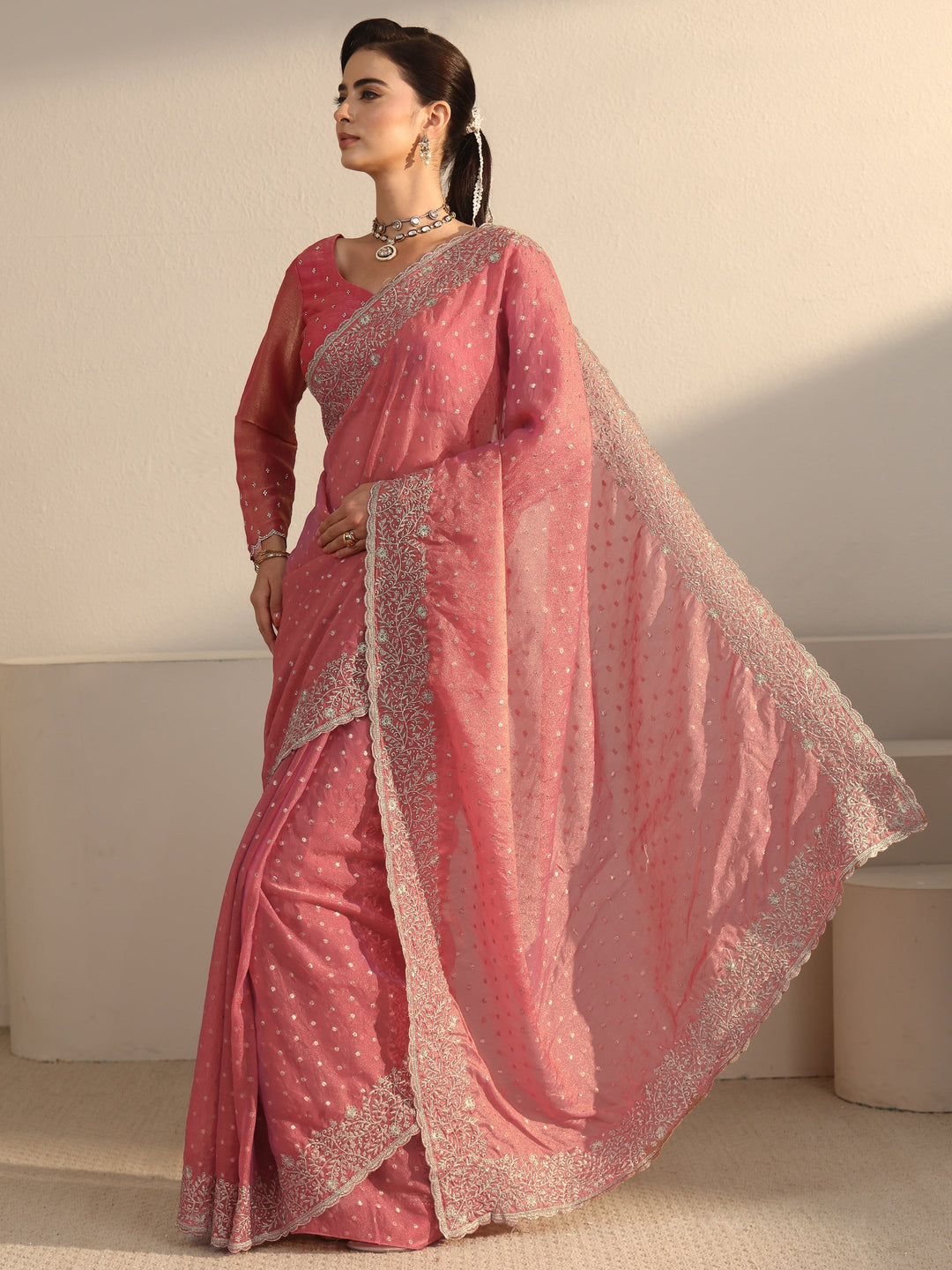  Libas Peach Woven Design Tissue Saree with Floral Border 