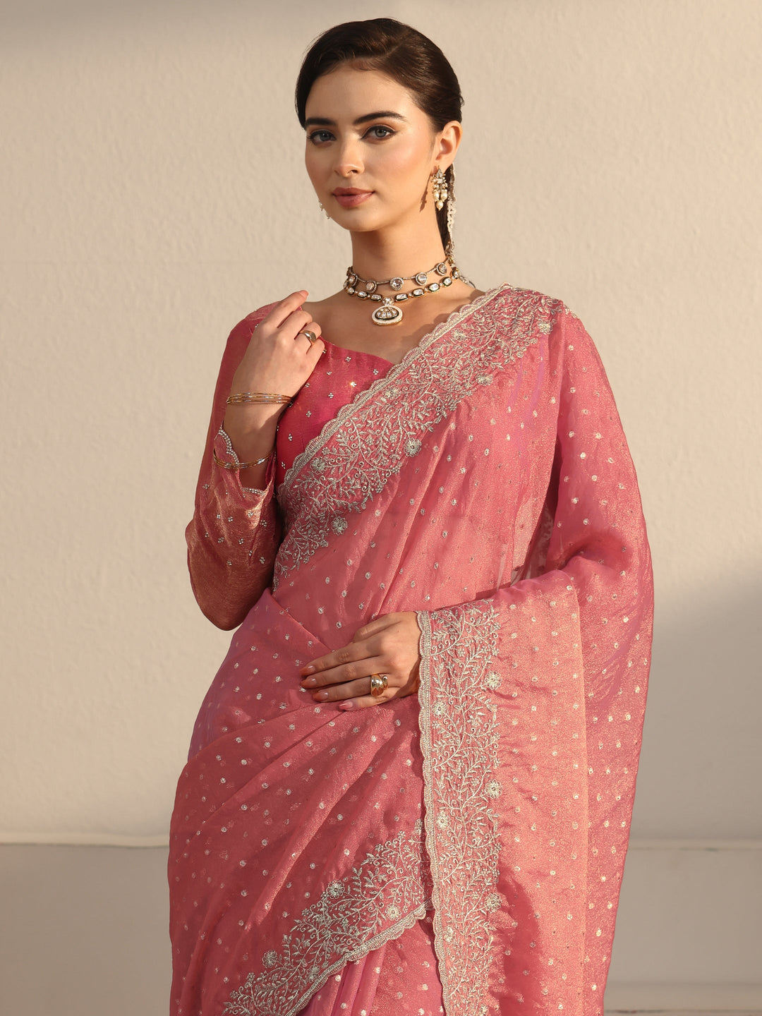  Libas Peach Woven Design Tissue Saree with Floral Border 