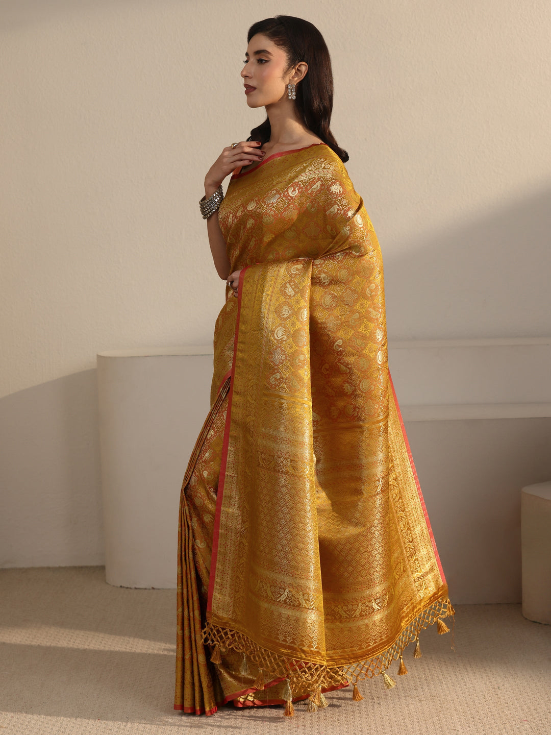  Libas Art Mustard Patola Woven Design Silk Blend Tassel Saree 