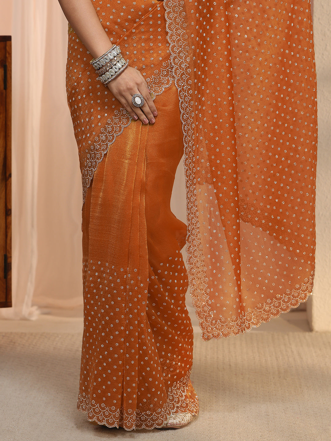  Libas Orange Embellished Tissue Saree with Scalloped Border 