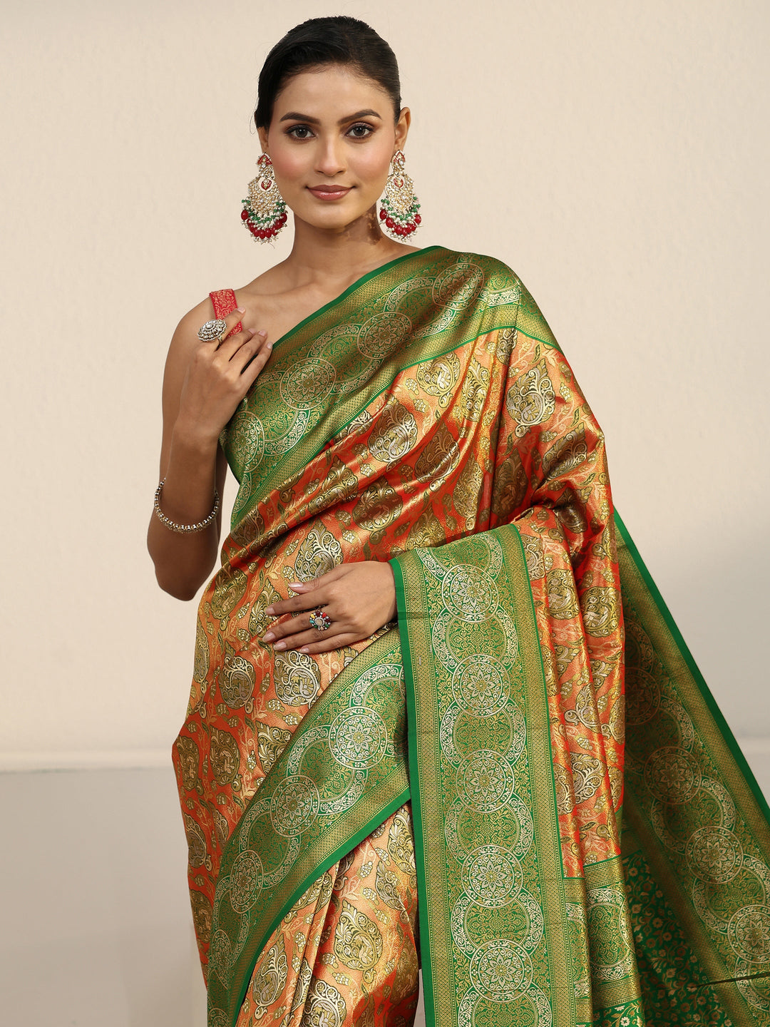  Libas Orange and Green Floral Woven Design Silk Blend Tassel Saree 