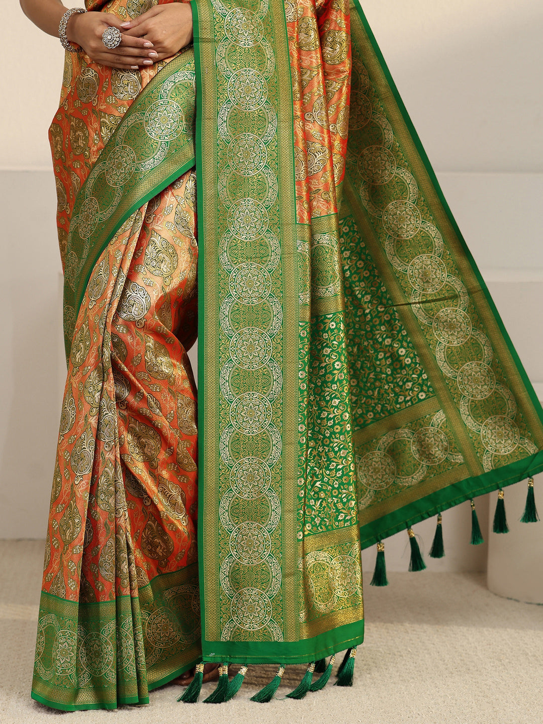 Libas Orange and Green Floral Woven Design Silk Blend Tassel Saree 