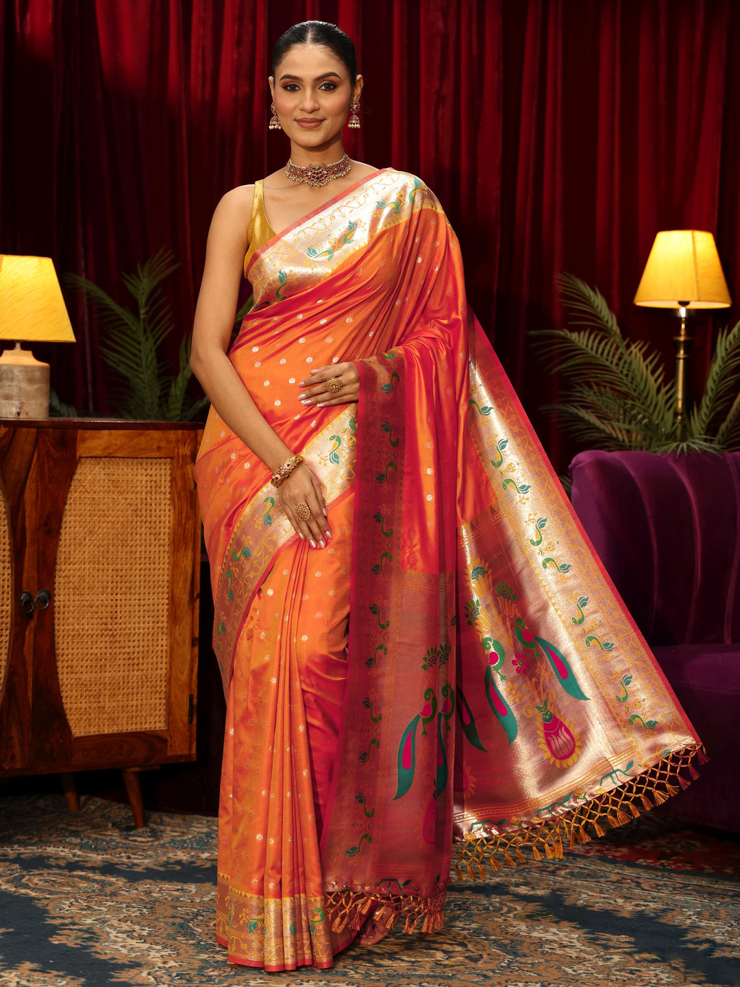  Libas Orange Silk Blend Paithani Tassel Saree 