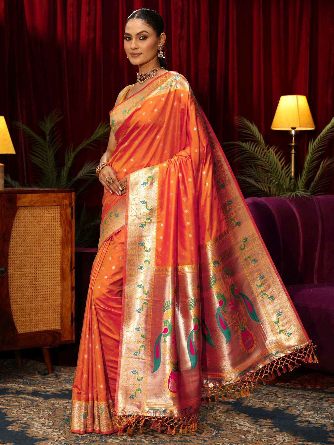  Libas Orange Silk Blend Paithani Tassel Saree 