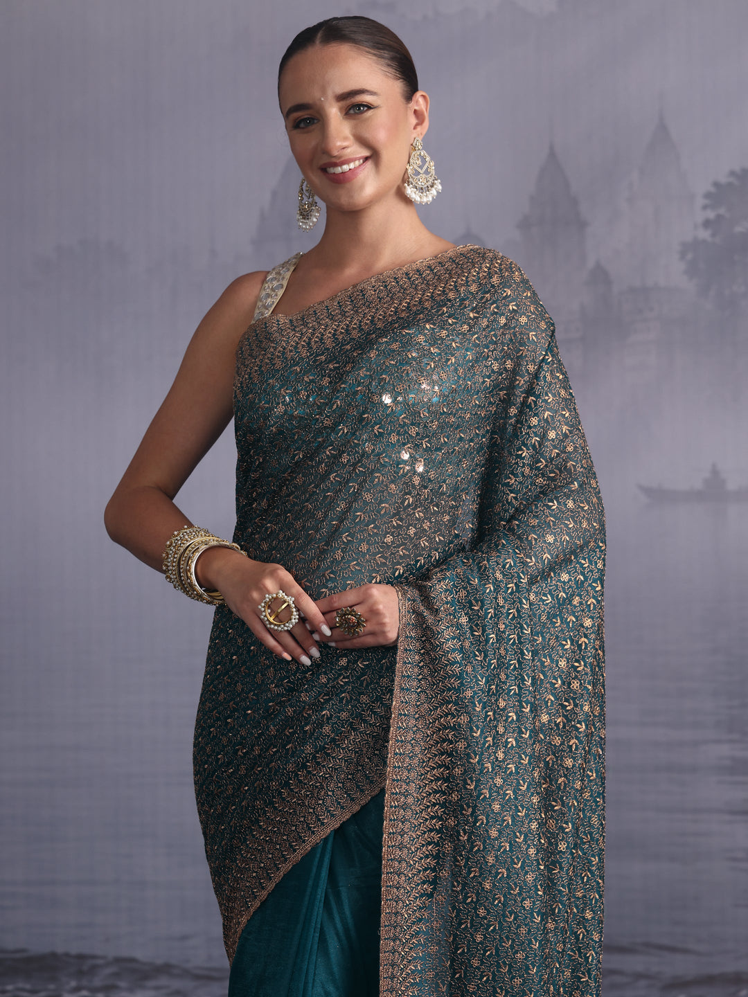  Libas Teal Blue Floral Embroidered Net Saree 