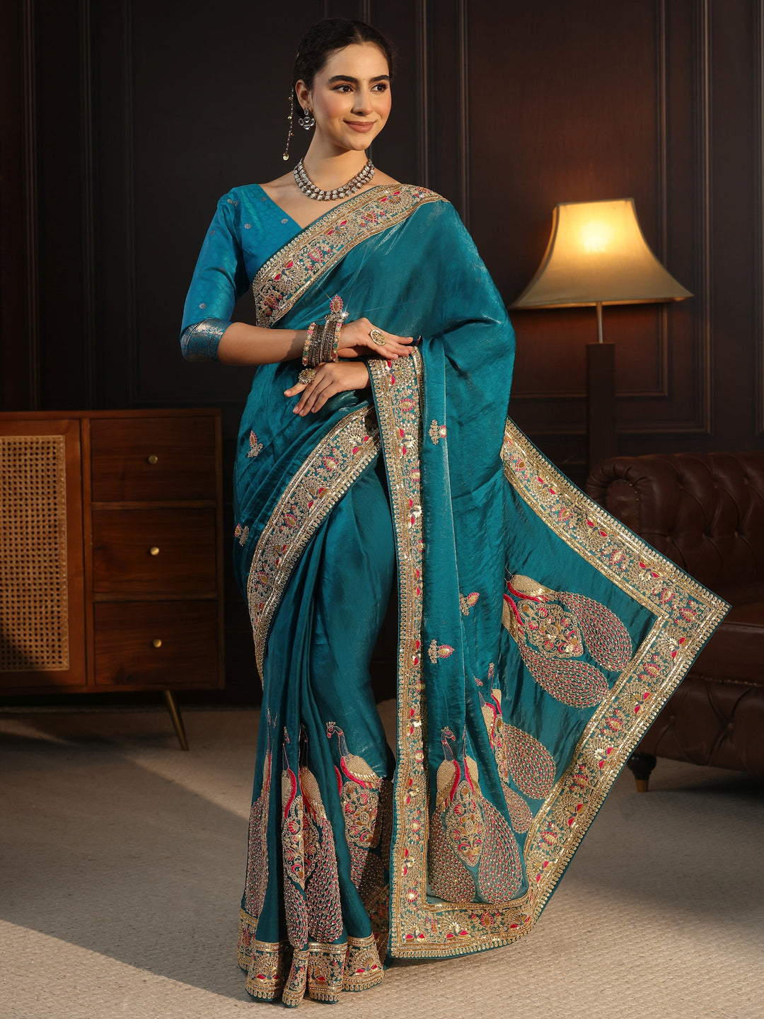  Libas Art Blue Embroidered Tissue Saree with Embellished Border 