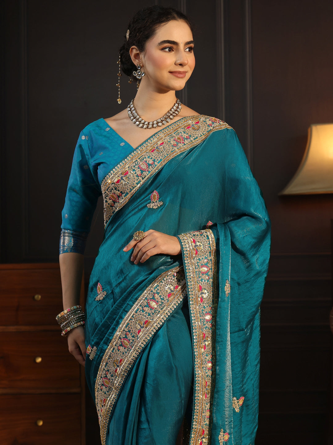  Libas Art Blue Embroidered Tissue Saree with Embellished Border 