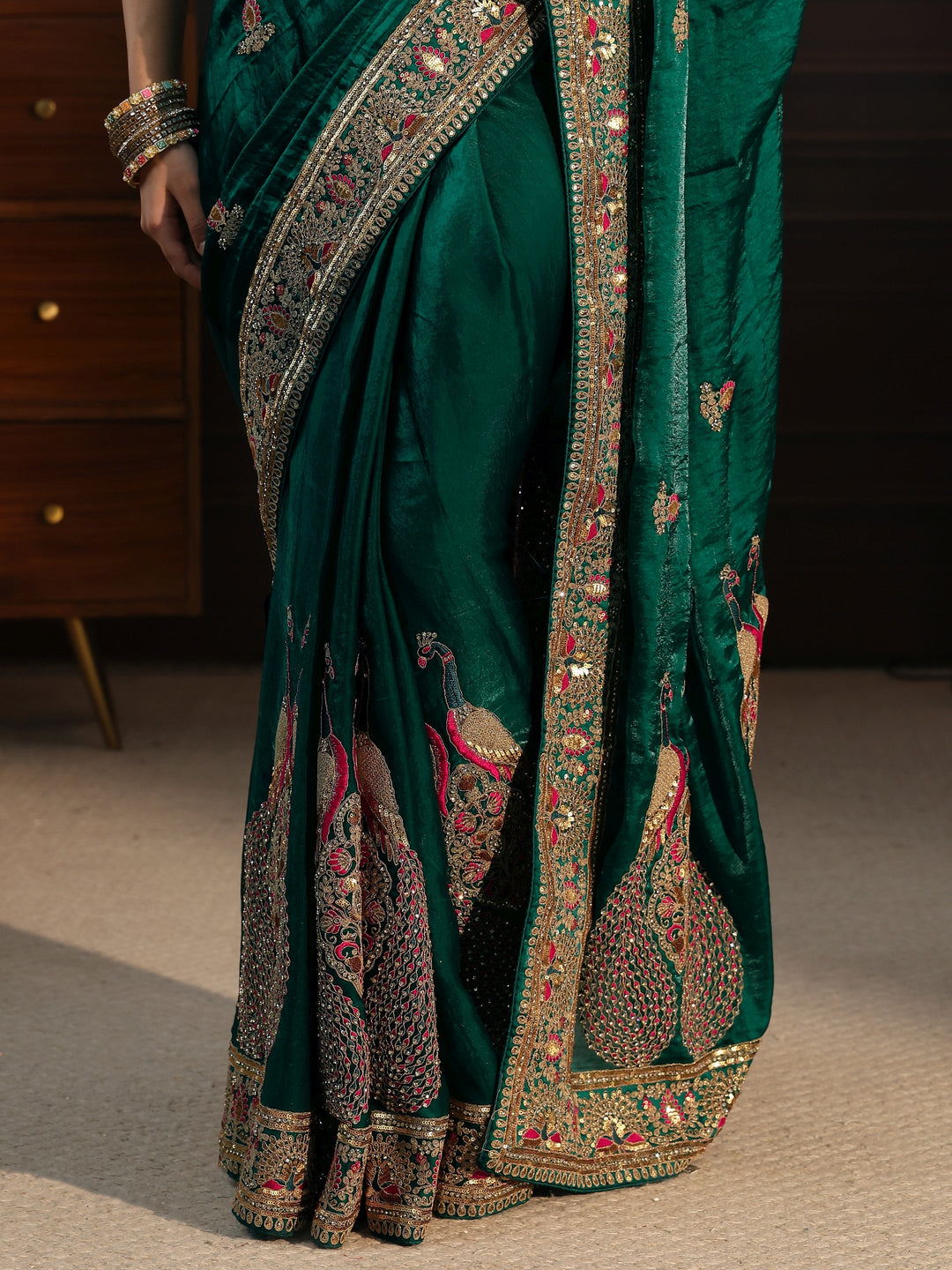  Libas Art Dark Green Embroidered Tissue Saree with Embellished Border 