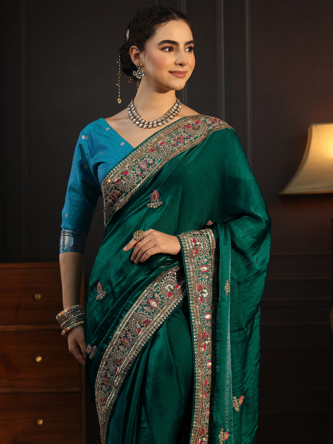  Libas Art Dark Green Embroidered Tissue Saree with Embellished Border 