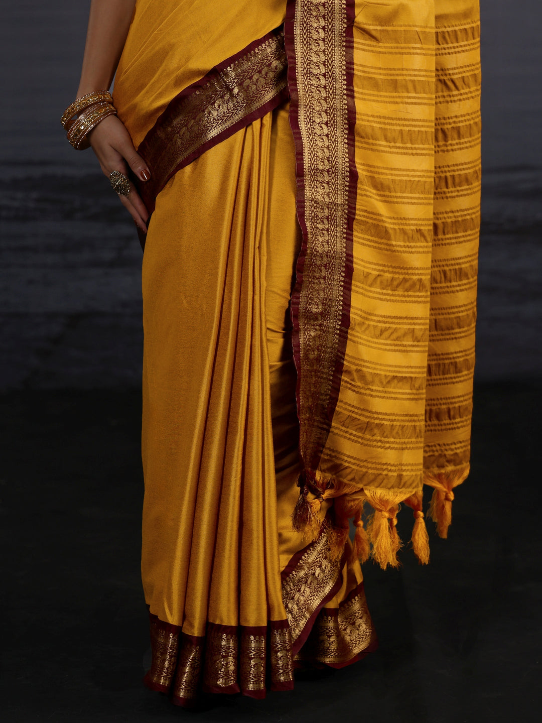  Libas Mustard and Maroon Silk Blend Tassel Saree with Woven Border 