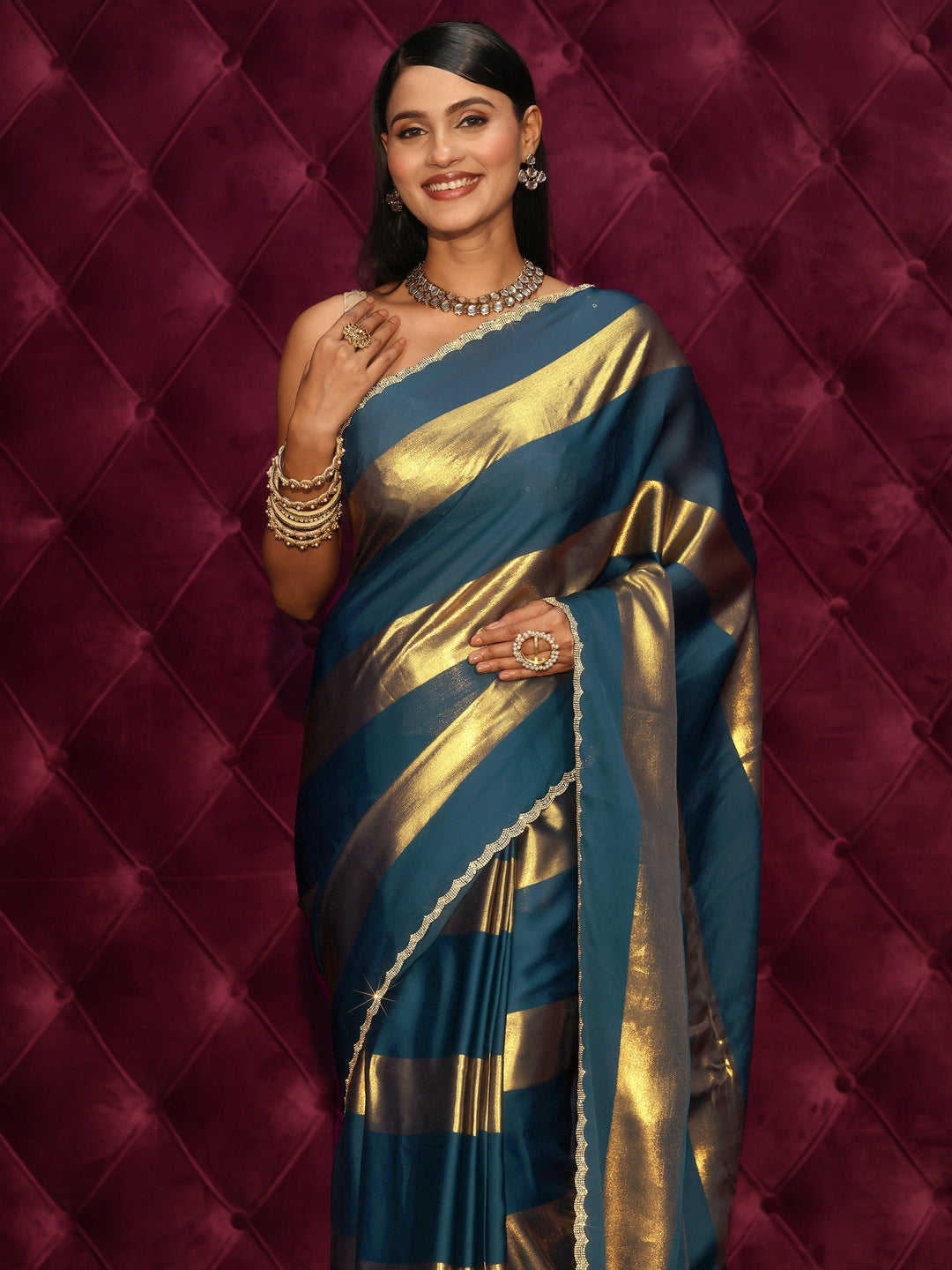  Libas Teal Blue Striped Chiffon Saree with Embellished Border 