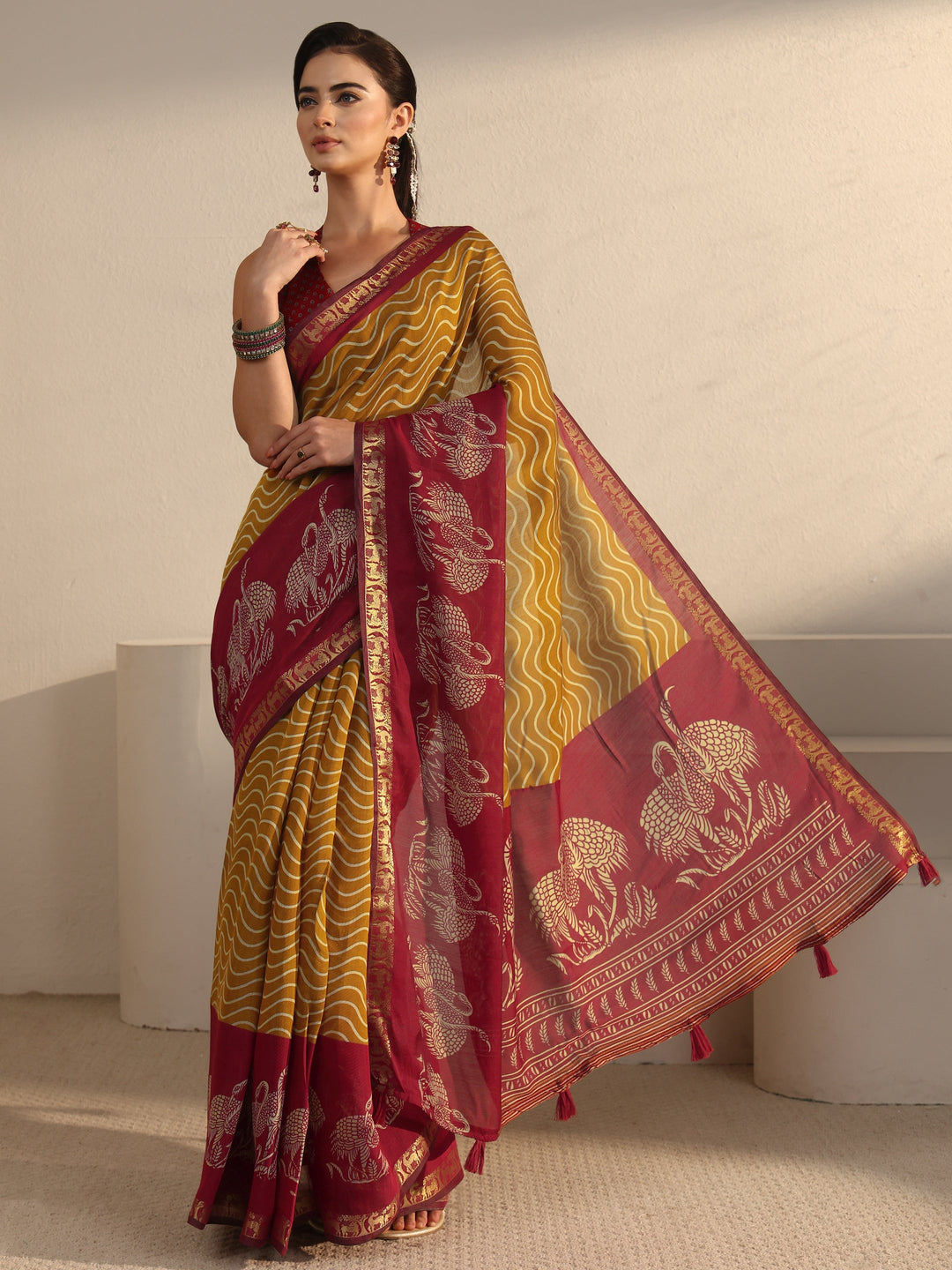  Libas Mustard and Red Wavy Stripe Printed Silk Blend Tassel Saree 