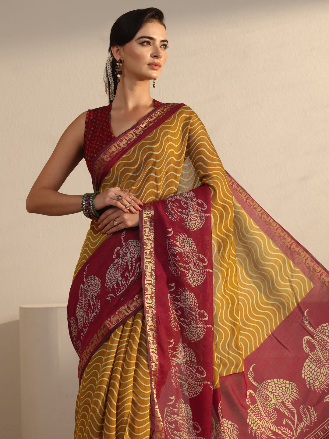  Libas Mustard and Red Wavy Stripe Printed Silk Blend Tassel Saree 
