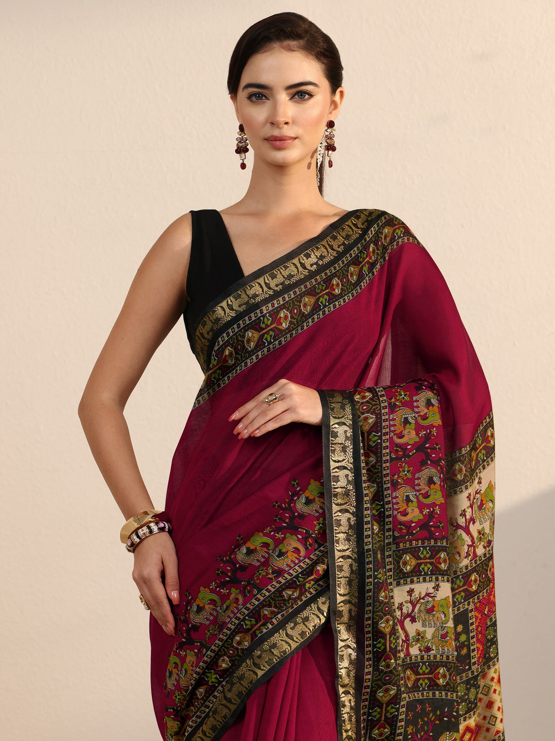  Libas Maroon and Black Printed Silk Blend Tassel Saree 