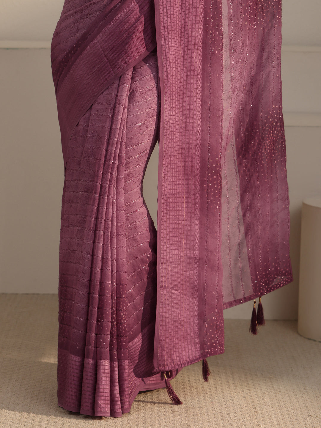  Libas Mauve Striped Georgette Tassel Saree with Embellishments 