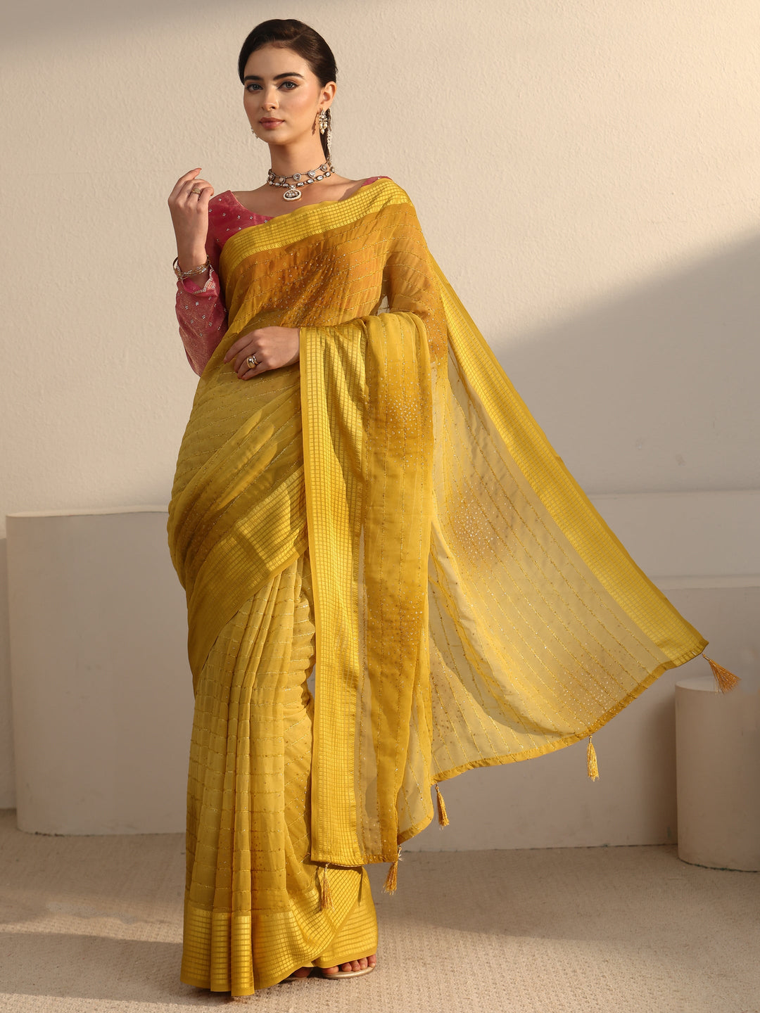  Libas Mustard Striped Georgette Tassel Saree with Embellishments 