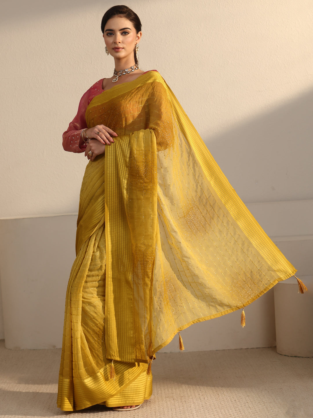  Libas Mustard Striped Georgette Tassel Saree with Embellishments 