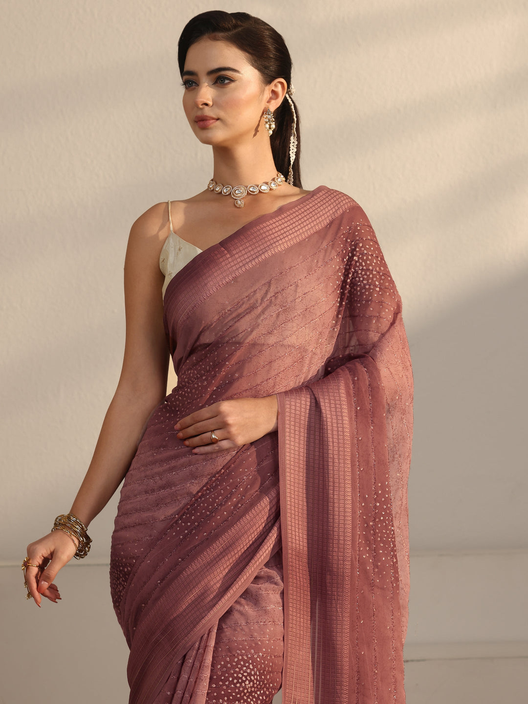  Libas Brown Striped Georgette Tassel Saree with Embellishments 