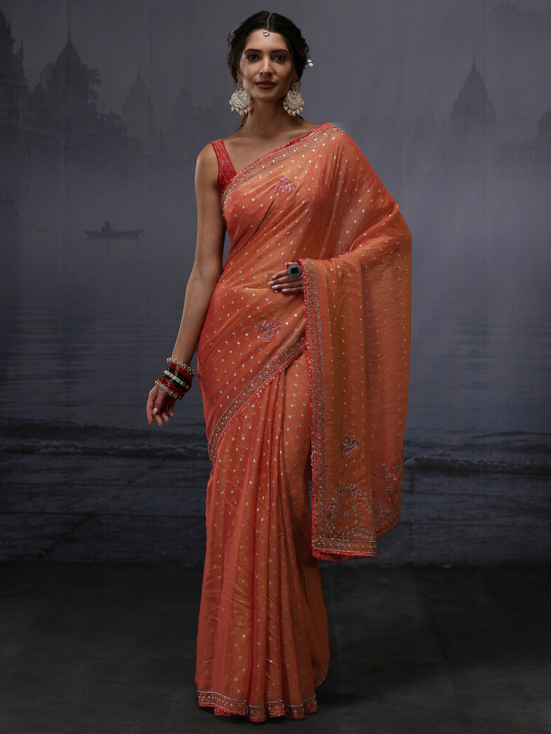  Libas Orange Woven Design Tissue Saree with Stone Work 
