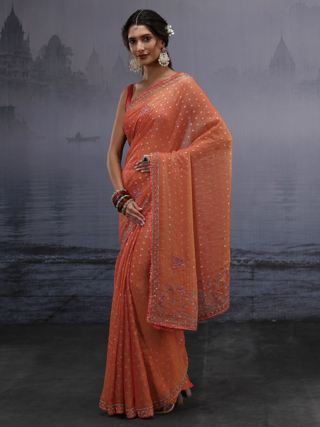  Libas Orange Woven Design Tissue Saree with Stone Work 