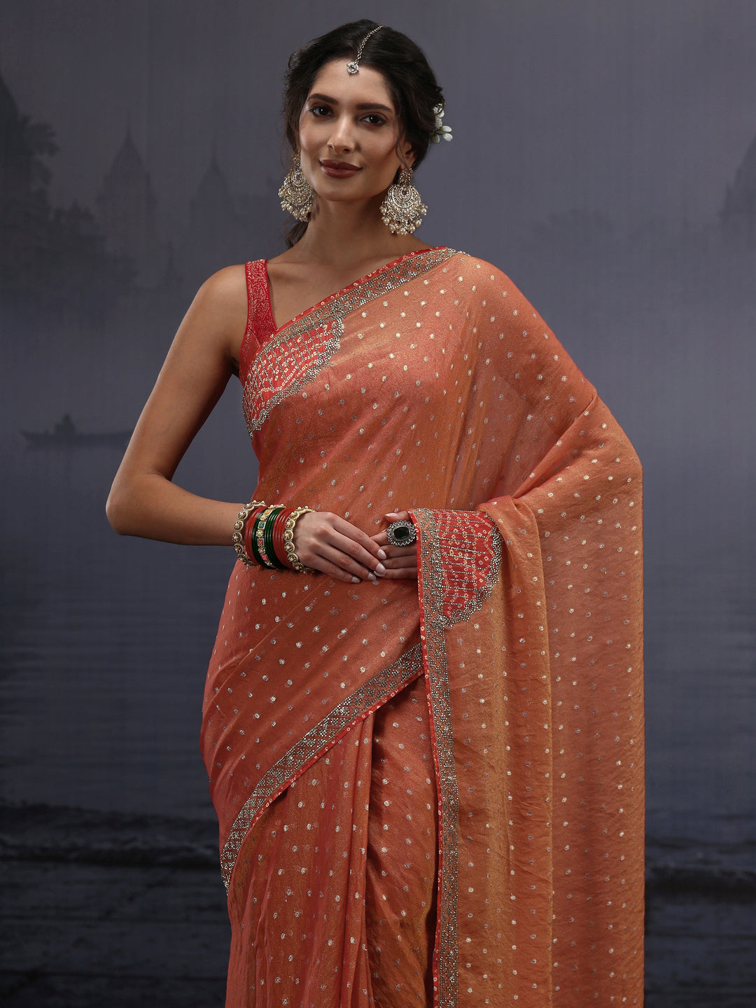  Libas Orange Woven Design Tissue Saree with Applique Work 