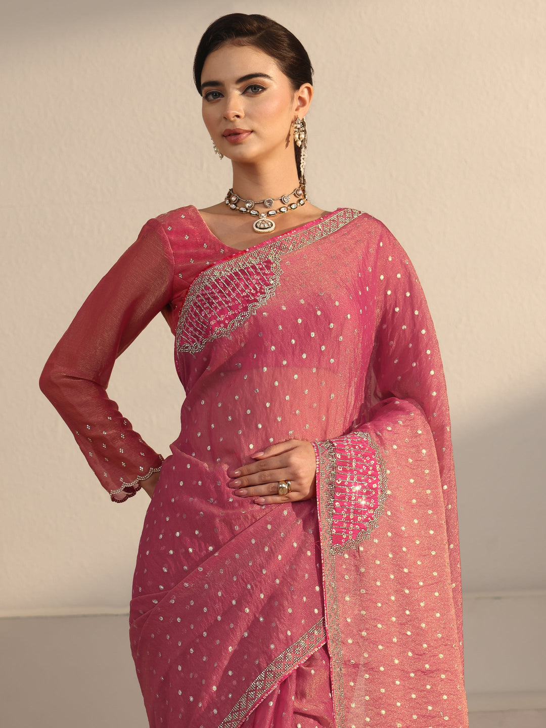  Libas Pink Woven Design Tissue Saree with Applique Design 
