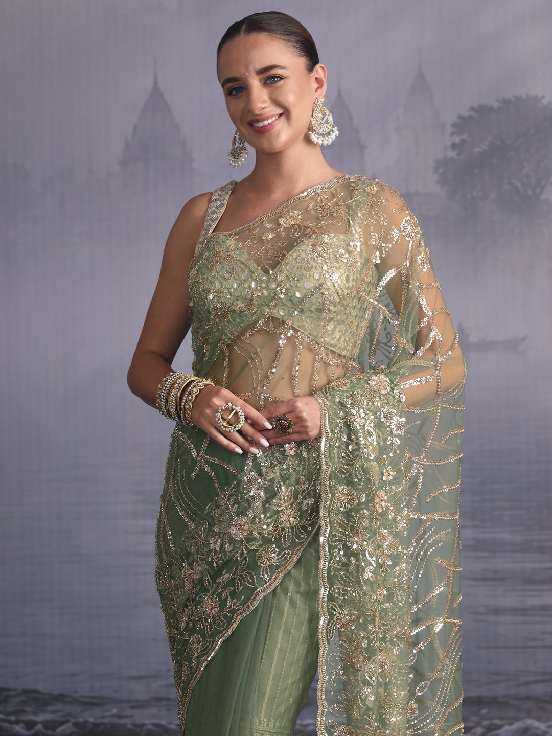  Libas Art Sage Green Sequin Embellished Net Saree 