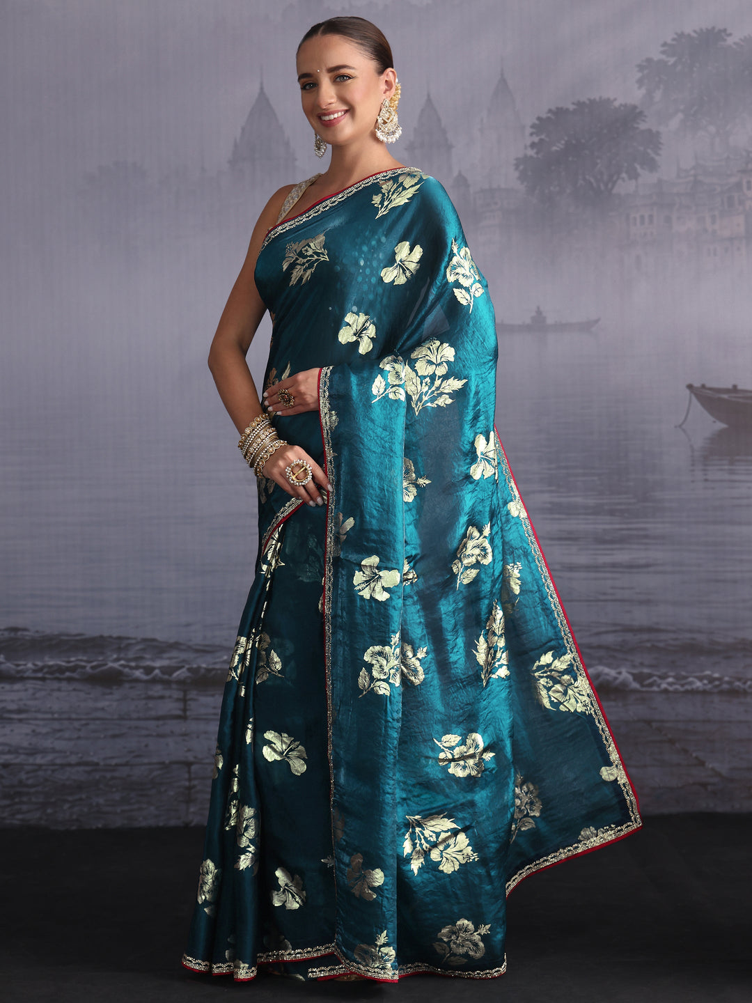  Libas Teal Blue Floral Printed Tissue Saree with Embellished Border 