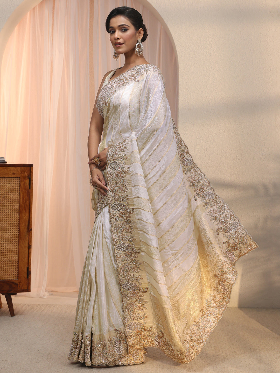  Libas Art Cream Woven Design Tissue Saree with Embellished Border 