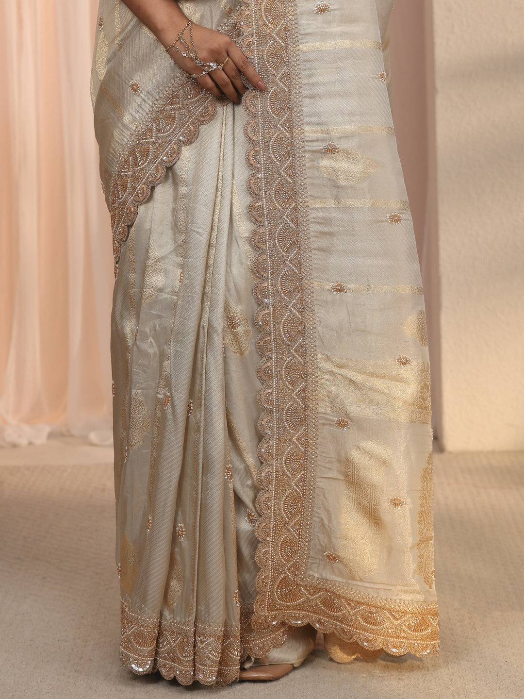  Libas Art Taupe Woven Design Tissue Saree with Embellished Border 