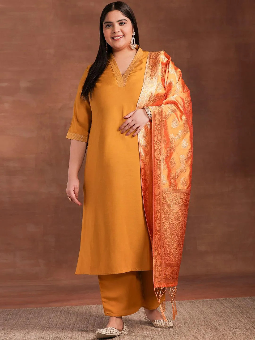 Plus Size Mustard Solid Silk Blend Straight Suit With Dupatta - Libas 