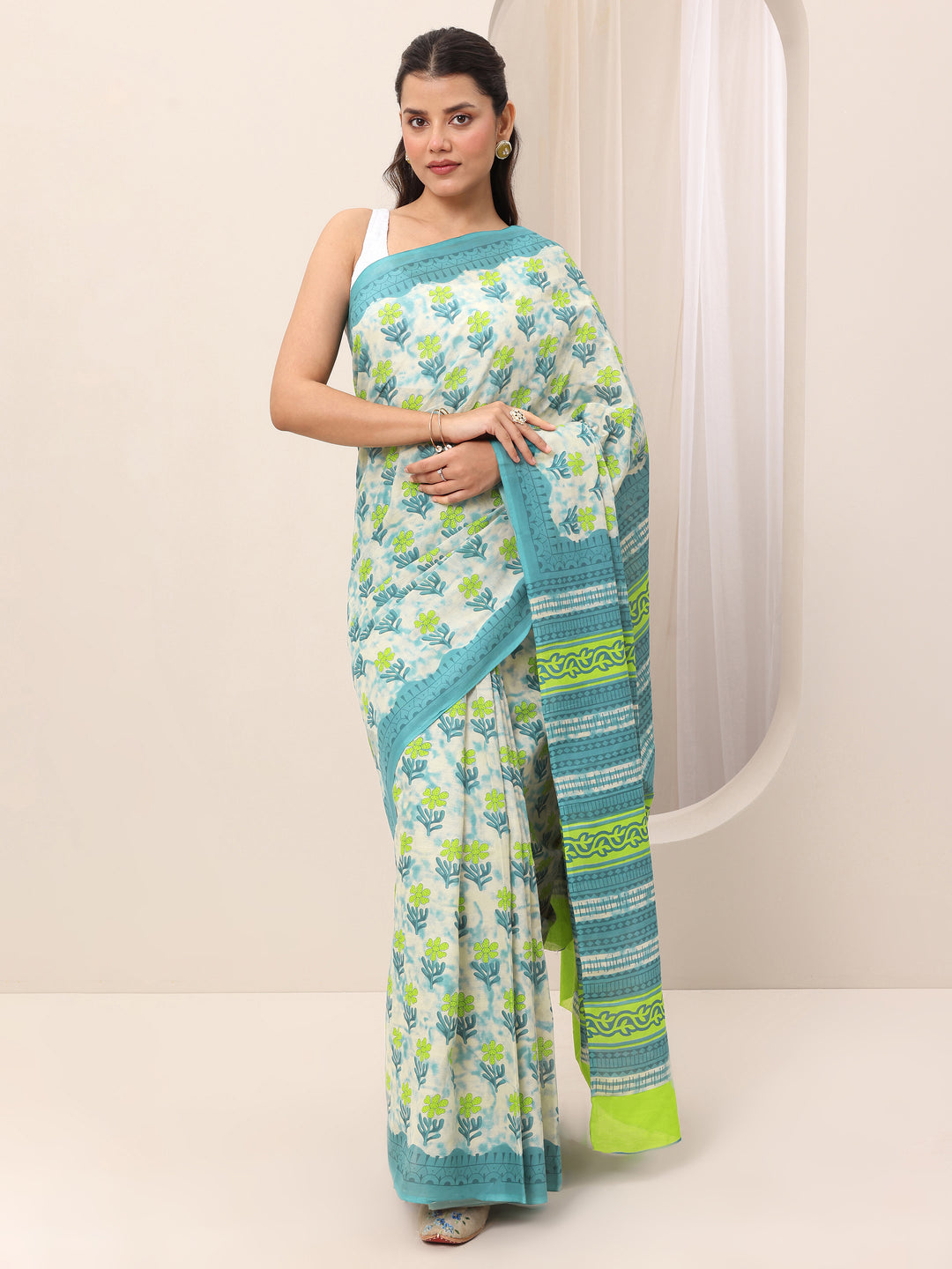  Teal Printed Cotton Saree With Unstitched Blouse 