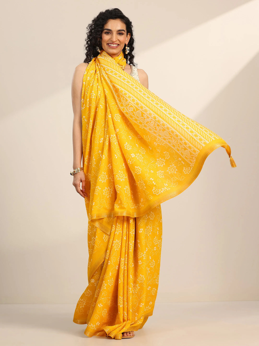 Yellow Printed Georgette Saree With Unstitched Blouse Piece 