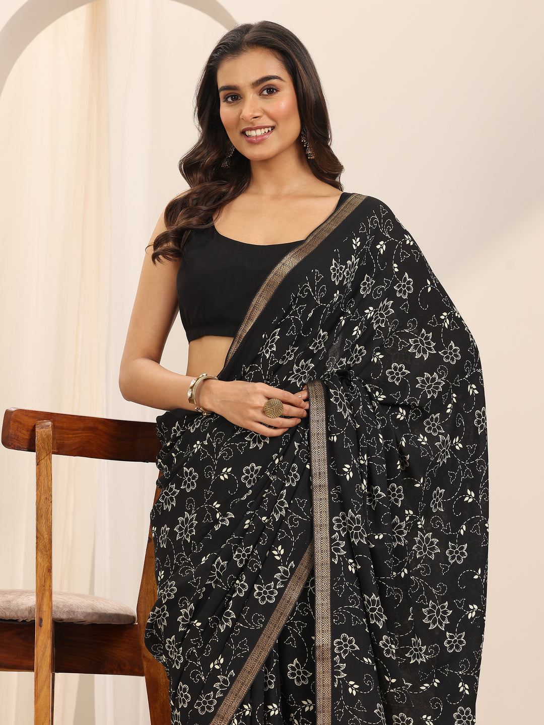  Black Printed Georgette Saree With Unstitched Blouse Piece 