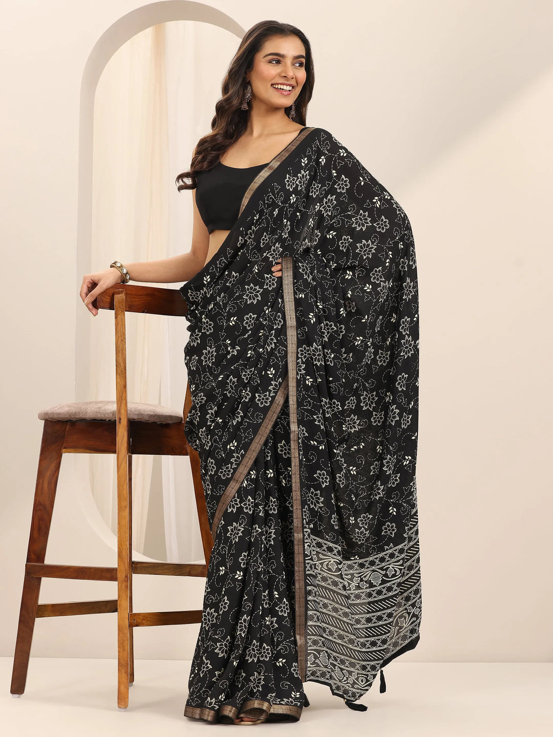  Black Printed Georgette Saree With Unstitched Blouse Piece 
