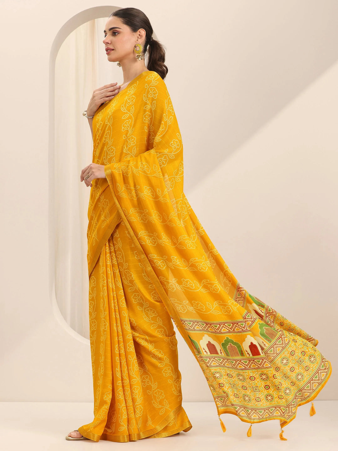  Yellow Printed Georgette Saree With Unstitched Blouse Piece 
