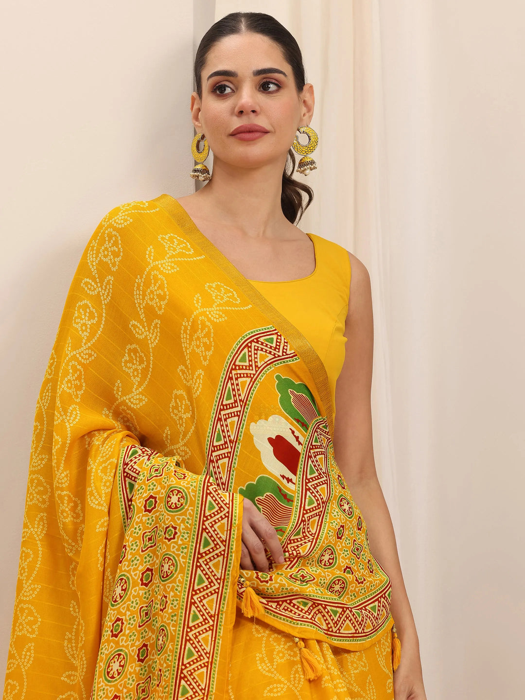  Yellow Printed Georgette Saree With Unstitched Blouse Piece 