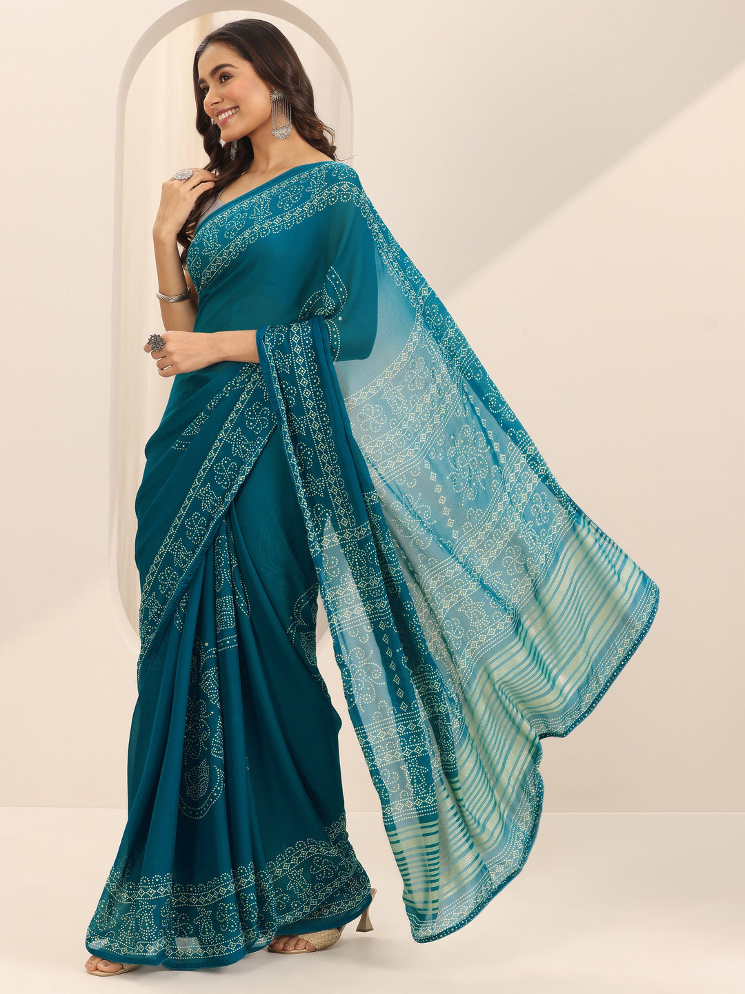  Teal Printed Georgette Saree With Unstitched Blouse Piece 