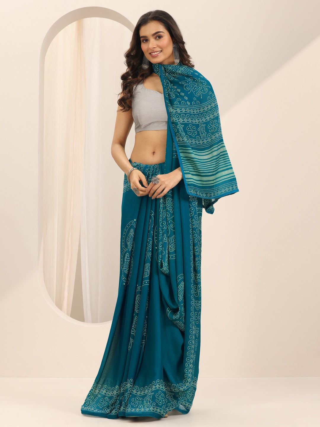  Teal Printed Georgette Saree With Unstitched Blouse Piece 
