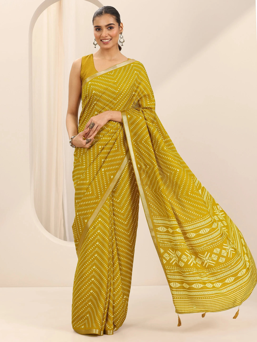  Mustard Printed Georgette Saree With Unstitched Blouse Piece 