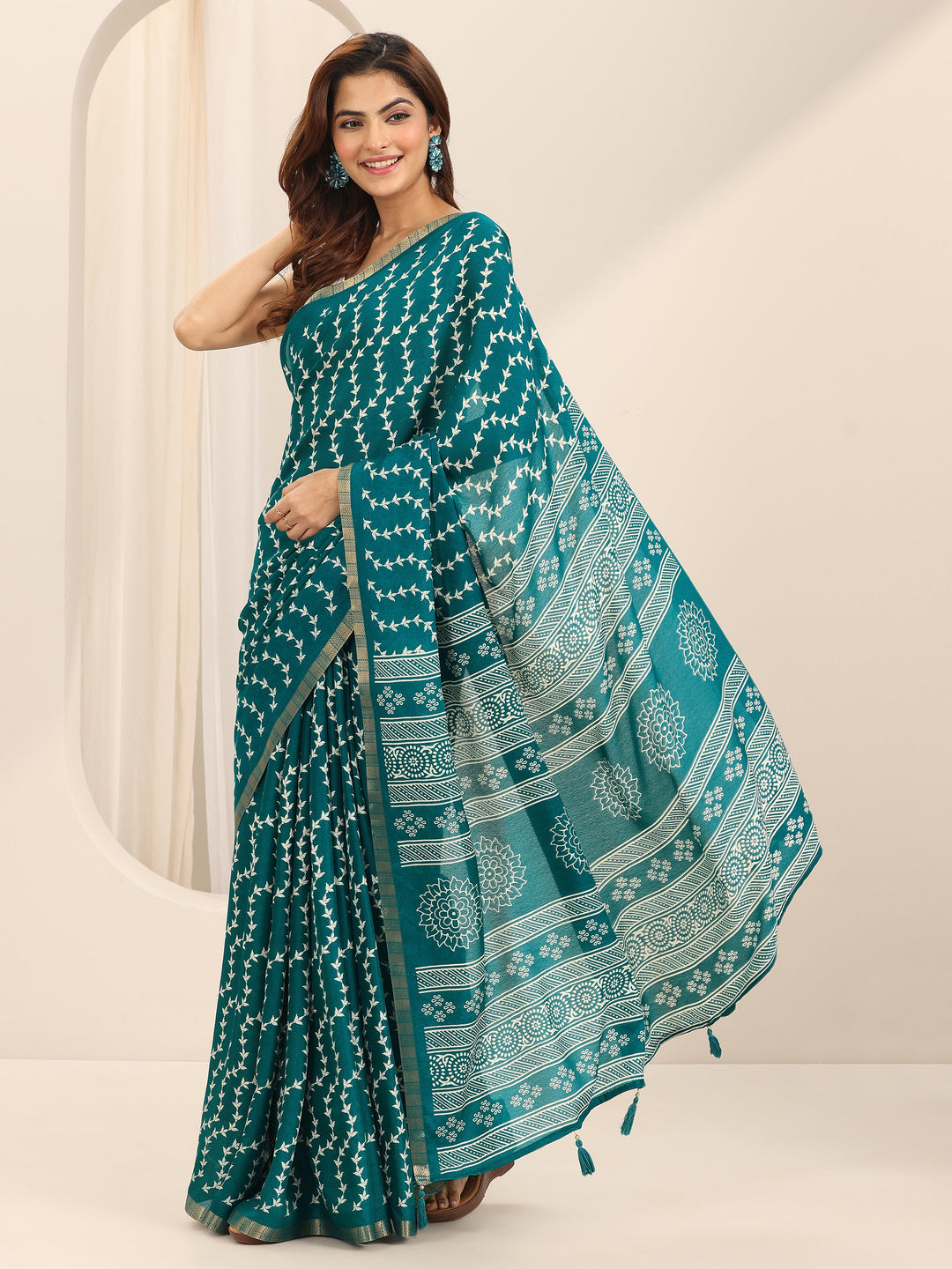  Teal Printed Georgette Saree With Unstitched Blouse Piece 