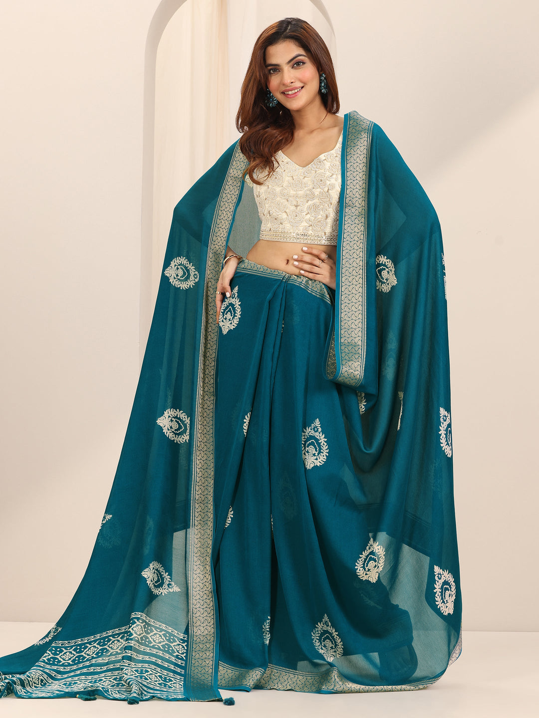  Teal Printed Georgette Saree With Unstitched Blouse Piece 