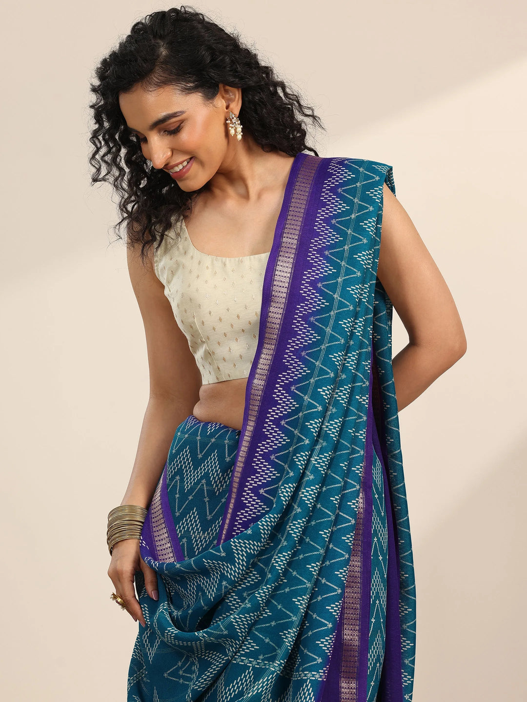  Teal Printed Georgette Saree With Unstitched Blouse Piece 