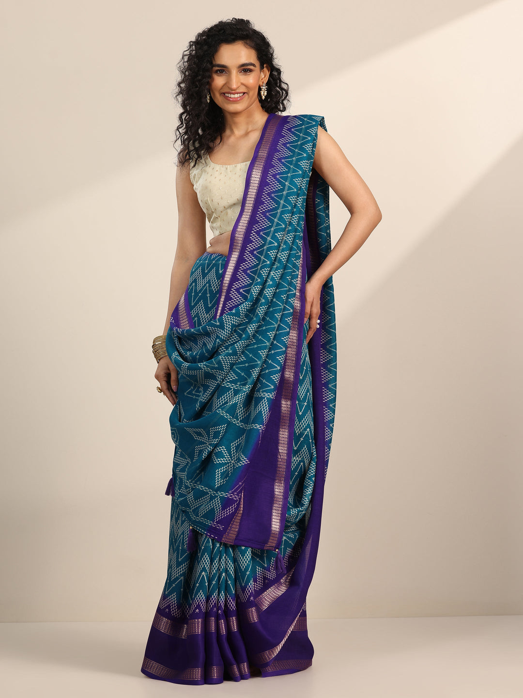 Teal Printed Georgette Saree With Unstitched Blouse Piece