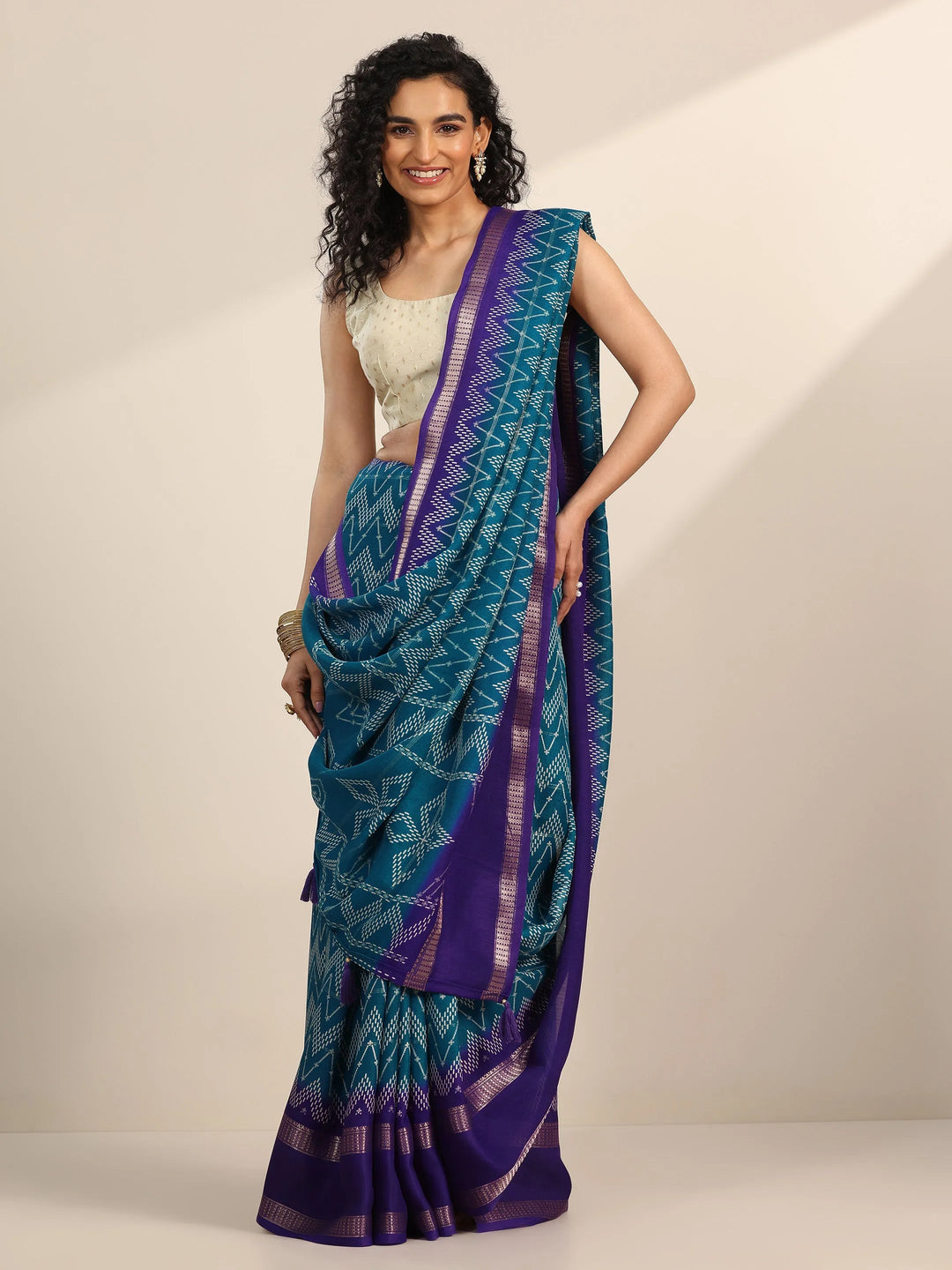  Teal Printed Georgette Saree With Unstitched Blouse Piece 