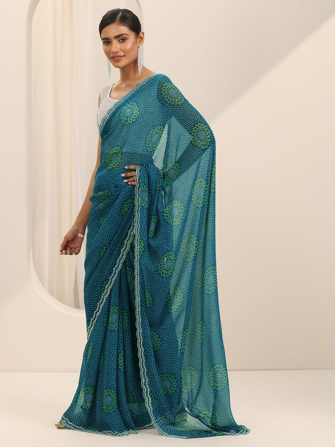  Teal Printed Georgette Saree With Unstitched Blouse Piece 