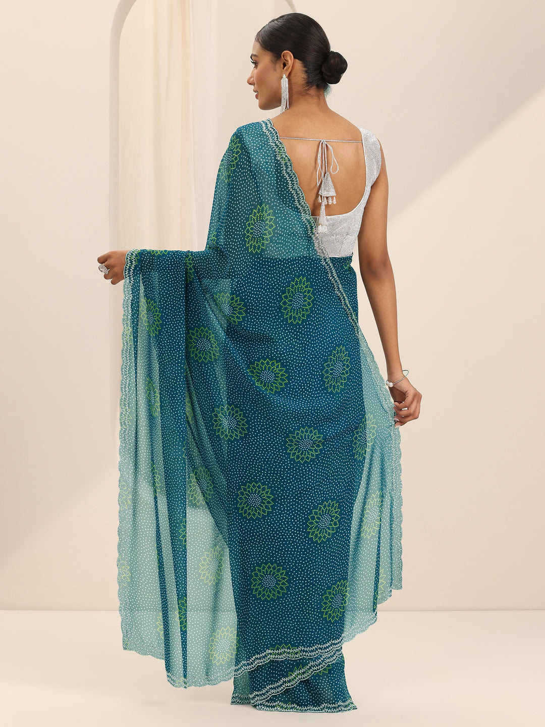  Teal Printed Georgette Saree With Unstitched Blouse Piece 
