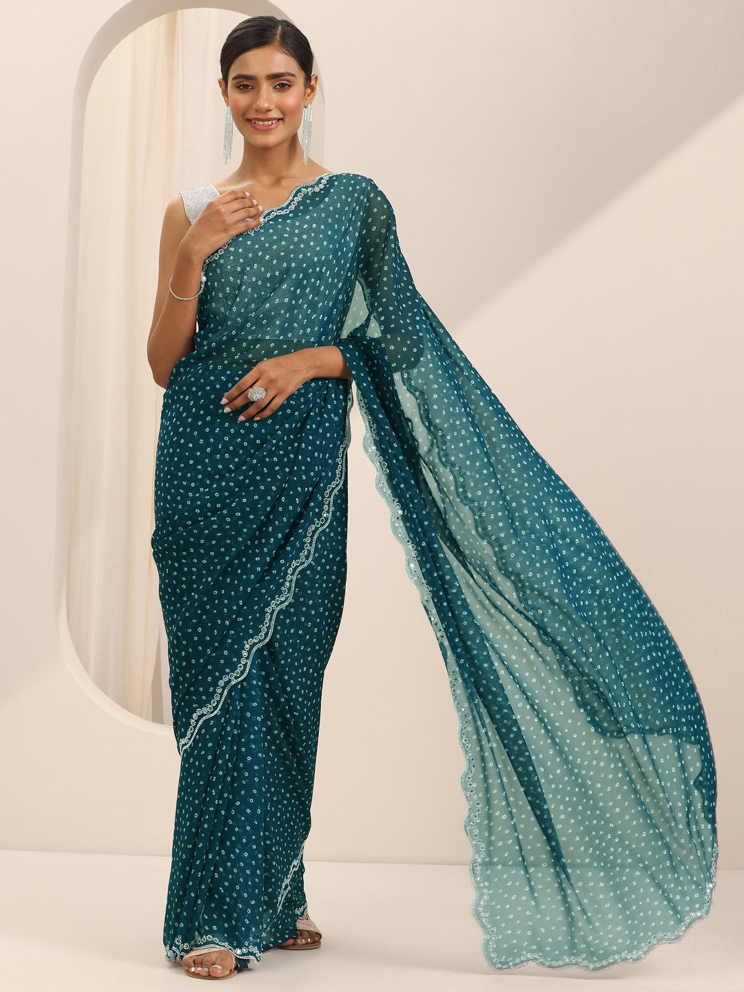  Teal Printed Georgette Saree With Unstitched Blouse Piece 