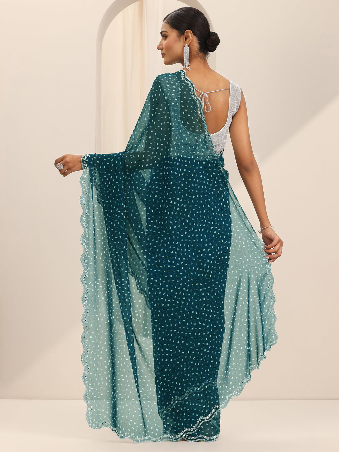  Teal Printed Georgette Saree With Unstitched Blouse Piece 